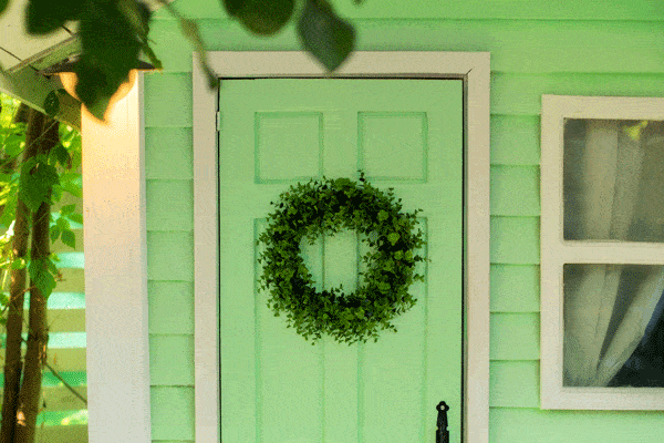 bigstock-Closeup-Of-Green-Door-And-Deco-435059987.gif