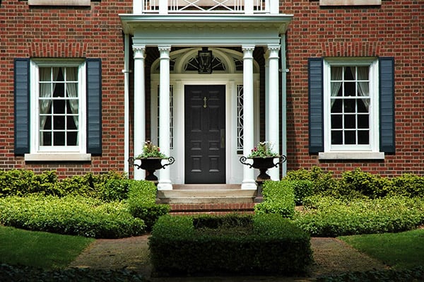 red-brick-house-with-a-front-entry-door-2.jpg