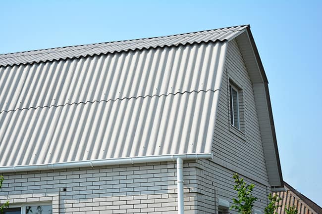 asbestos-cement-siding-on-a-roof-of-an-old-house-2.jpg