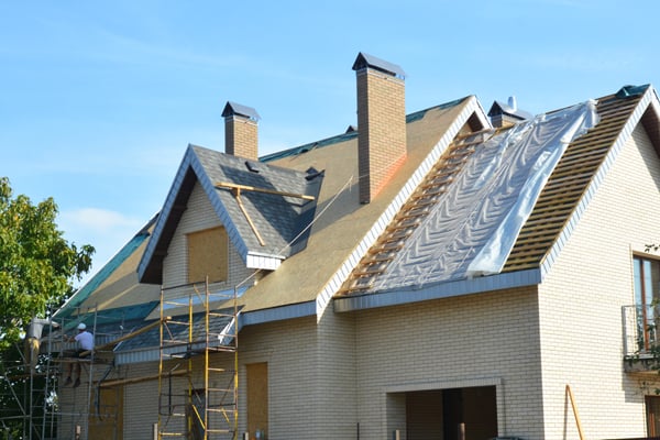 bigstock-Roofing-Contractors-Installing-.jpeg