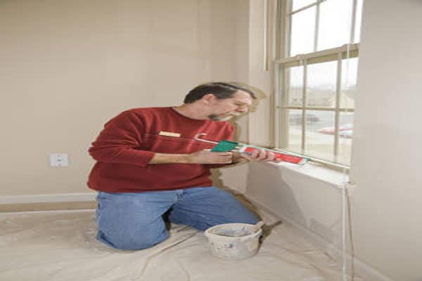 man-caulking-window-3.jpg