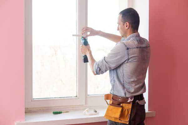 bigstock-Handyman-Using-A-Cordless-Scre-459584031.jpg