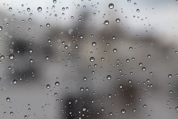 bigstock-Rain-Drops-On-The-Glass-In-The-444795050.jpg