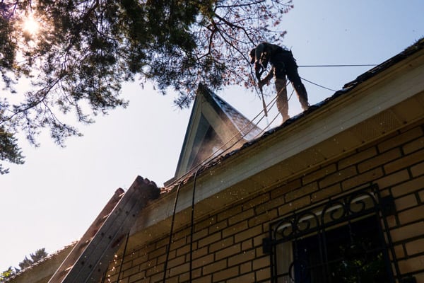 A-Man-Stands-On-The-Roof-2.jpeg