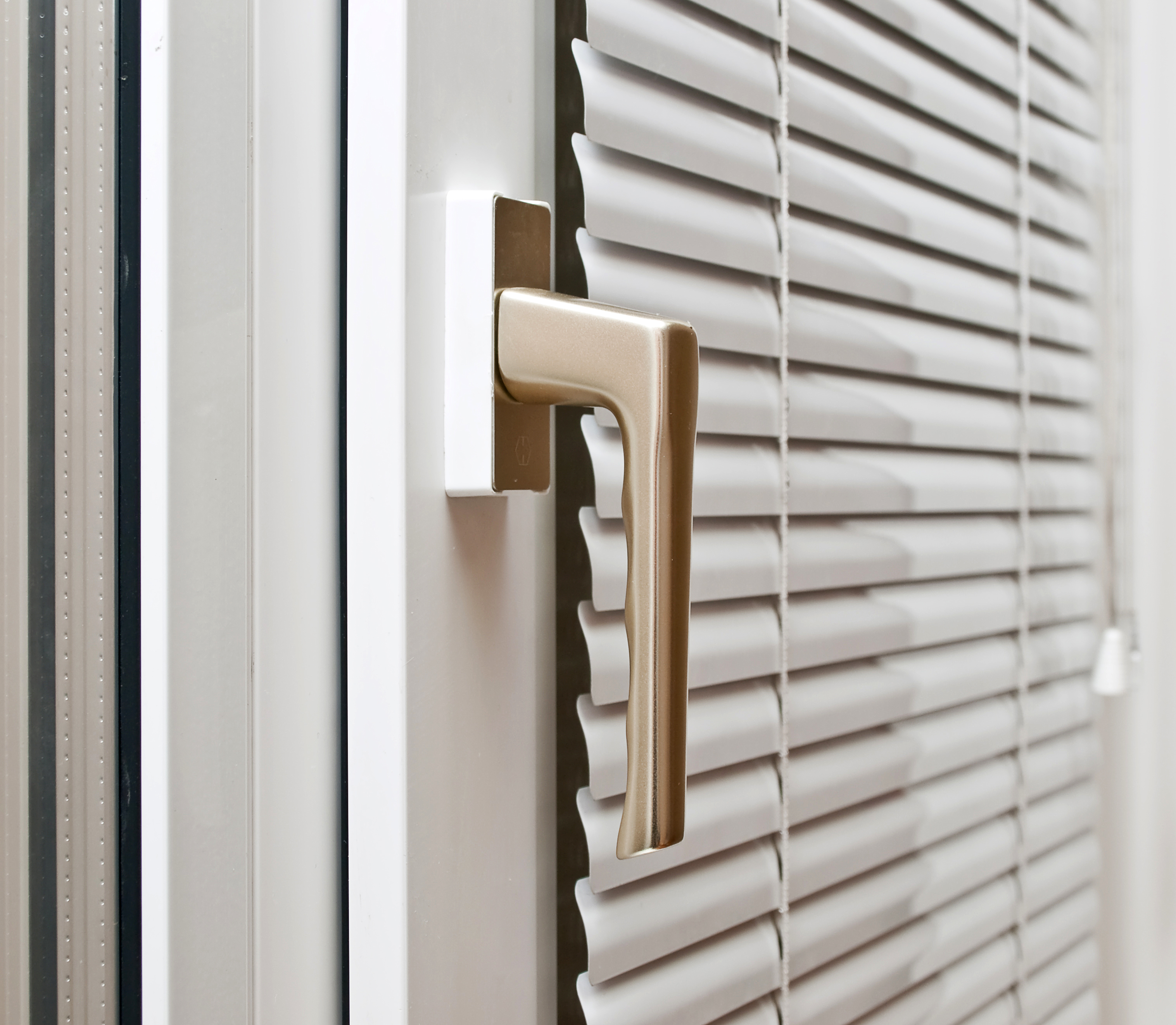 bigstock-Aluminium-Blinds-On-The-Plasti-7327247.jpg